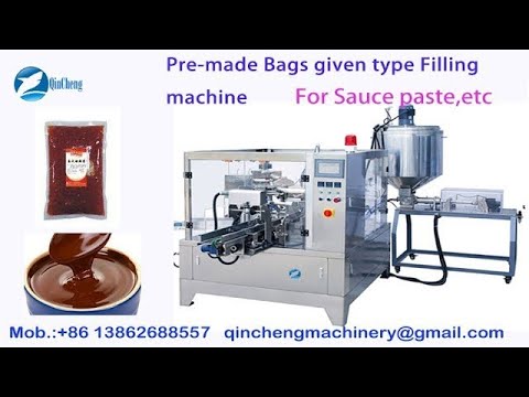 Pre made pouch packing machine.rotary pouch packing machine. bag given packing machine